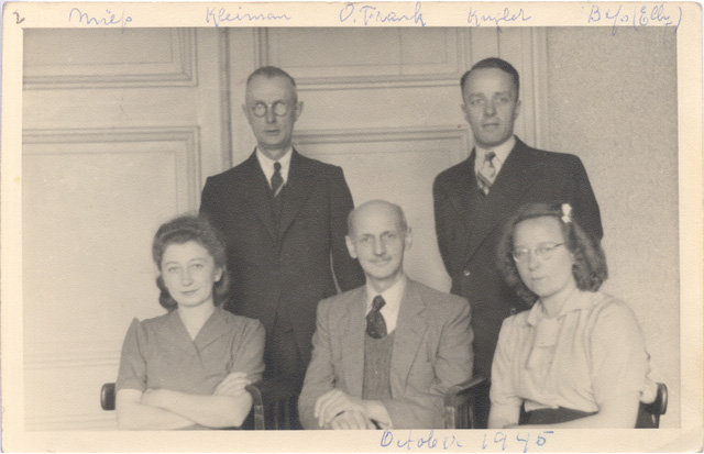 October 1945, Otto Frank seated in the middle with Miep Gies and Johannes Kleiman on the left, and Bep Voskuijl and Victor Kugler on the right.